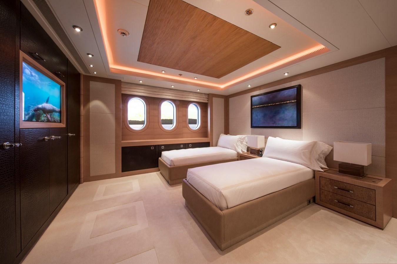 a room with a bed and a tv aboard CAIPIRINHA Yacht for Sale