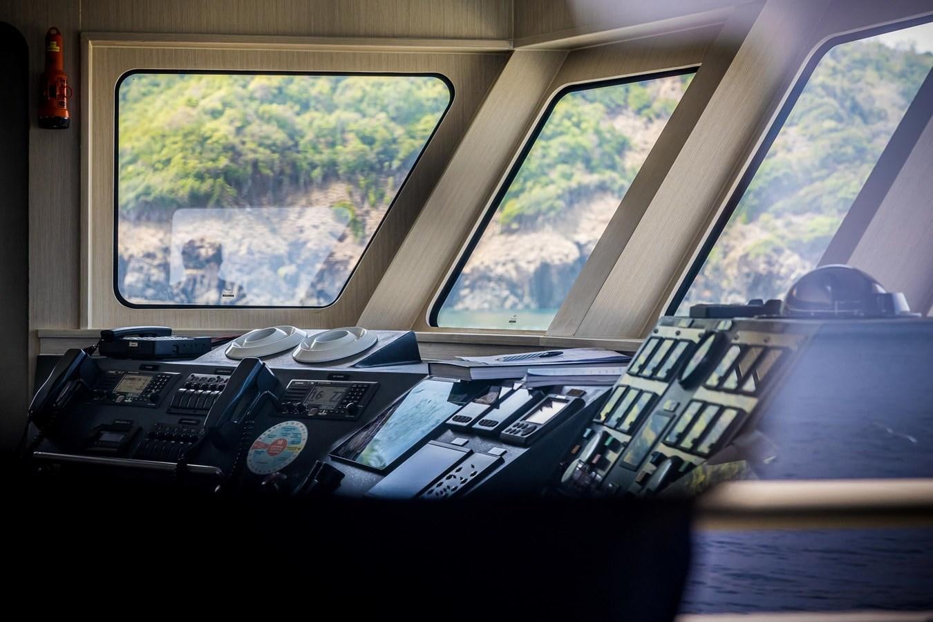 a cockpit with a lot of electronics aboard VANORA Yacht for Sale