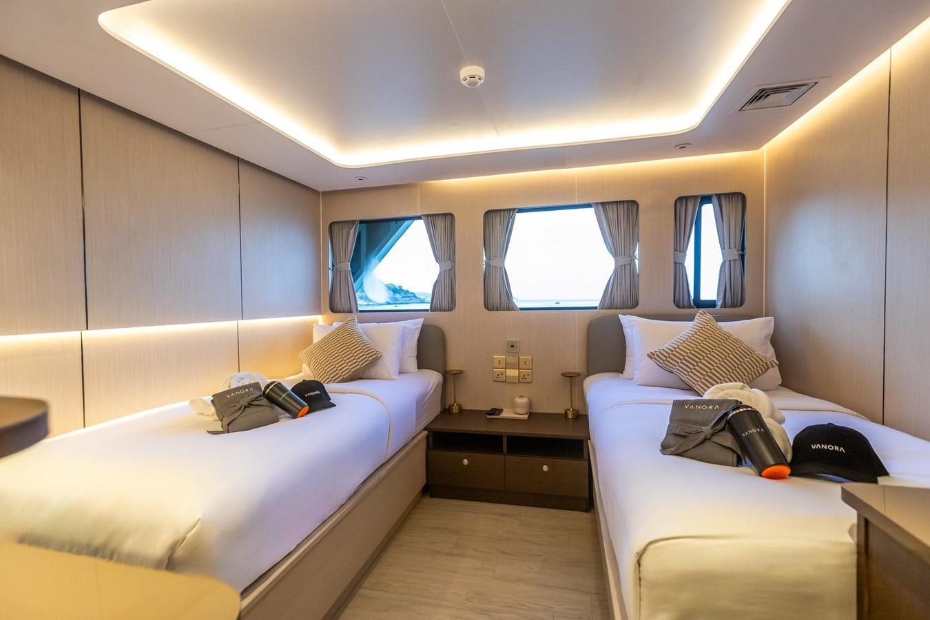 a couple of beds in a room aboard VANORA Yacht for Sale