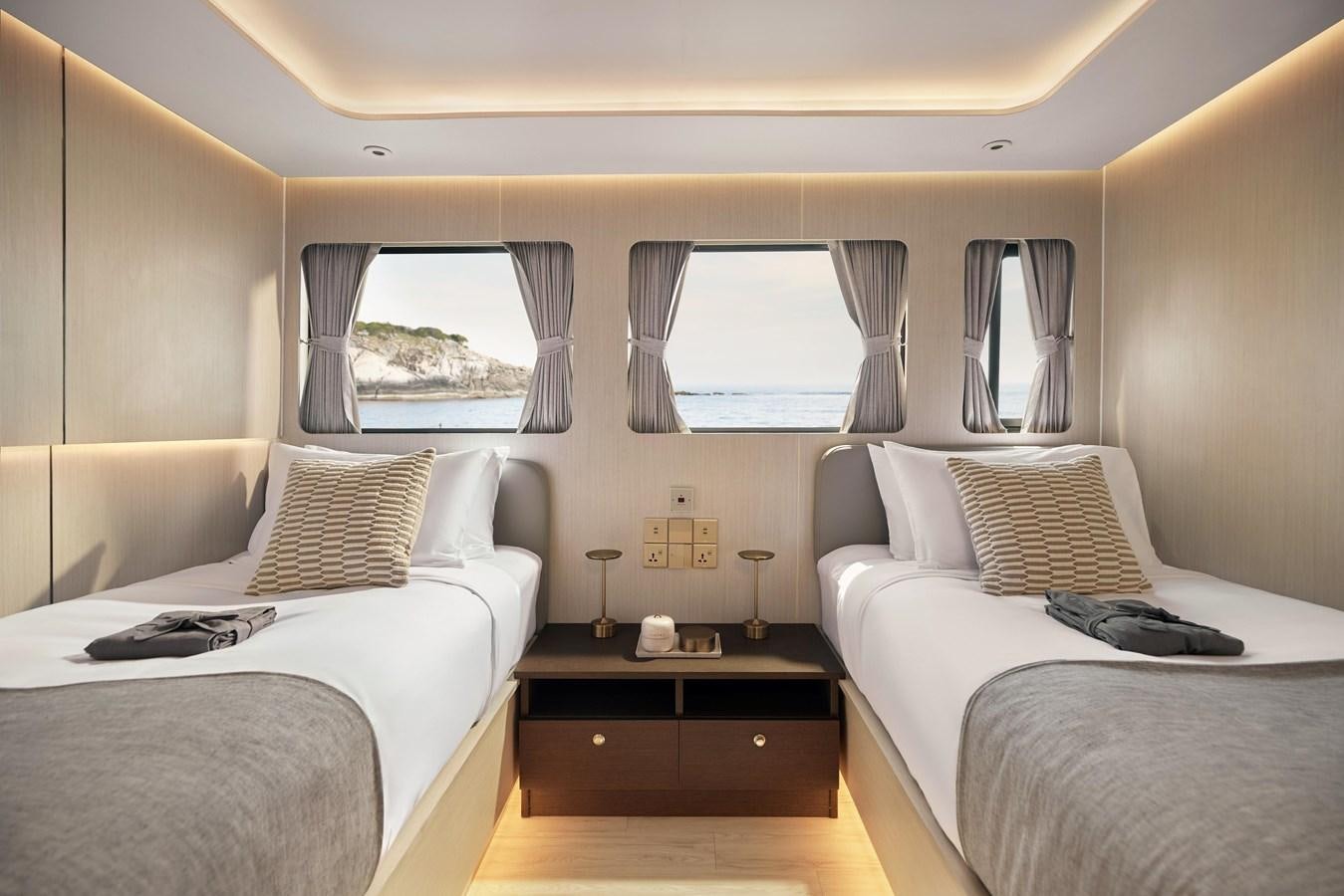 a couple of beds in a room aboard VANORA Yacht for Sale
