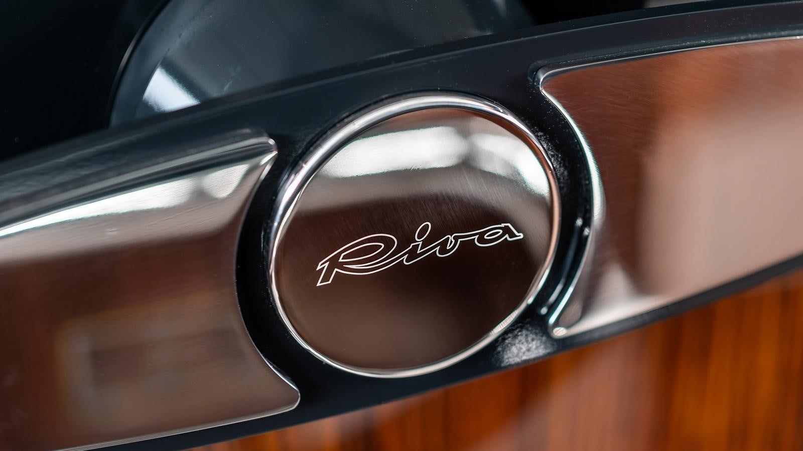 a car with a logo on the side aboard LADY FIRST Yacht for Sale