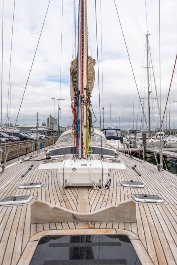 a tall tower with a red crane aboard ECOVER OF SKAGEN Yacht for Sale