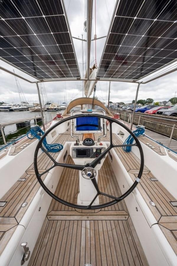 a large ship in a harbor aboard ECOVER OF SKAGEN Yacht for Sale