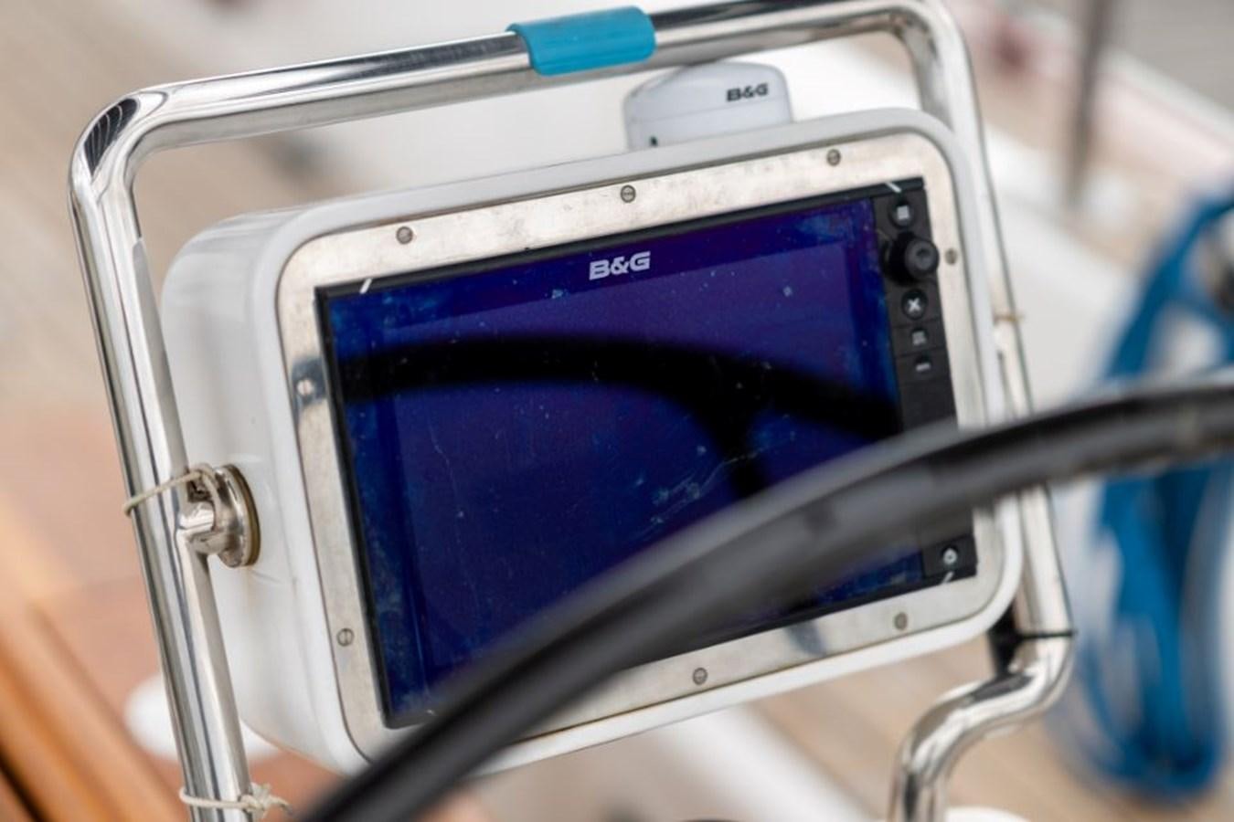 a handheld gaming device aboard ECOVER OF SKAGEN Yacht for Sale