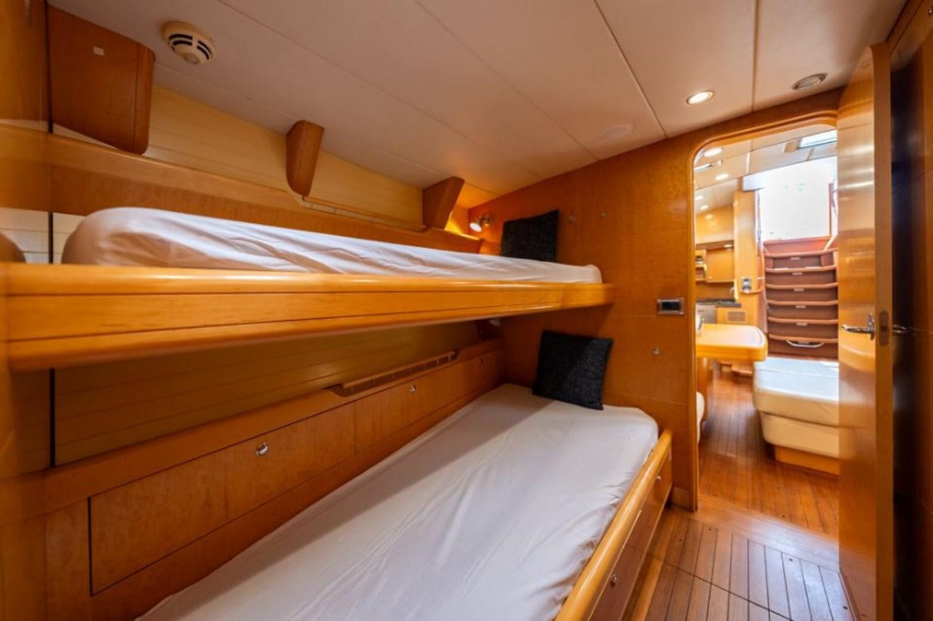 a room with bunk beds aboard ECOVER OF SKAGEN Yacht for Sale