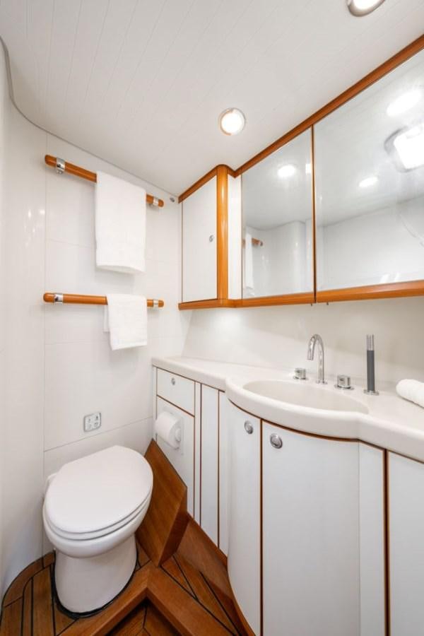 a bathroom with a toilet and sink aboard ECOVER OF SKAGEN Yacht for Sale