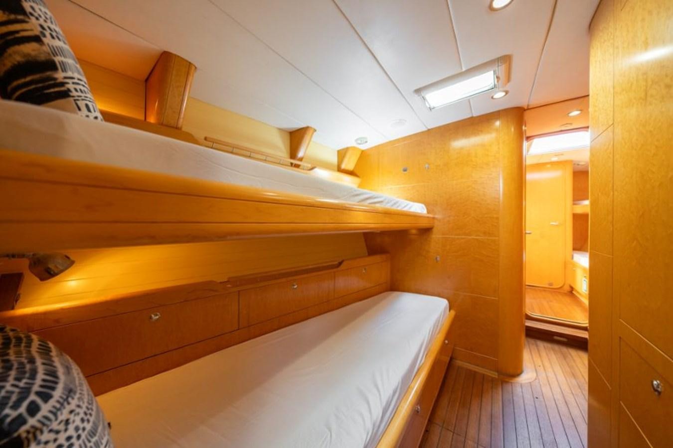 a room with wooden stairs aboard ECOVER OF SKAGEN Yacht for Sale