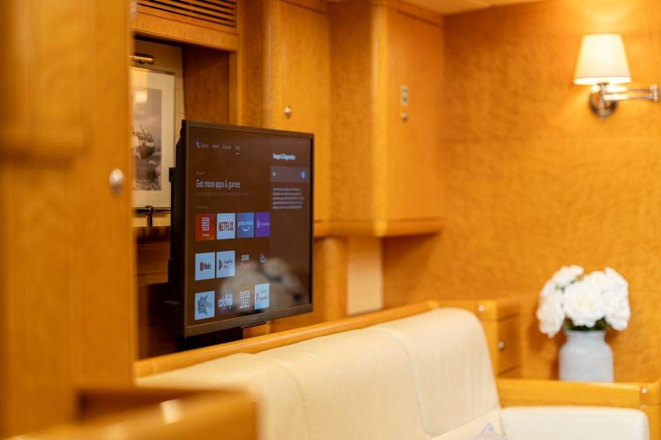 a tv on a wall aboard ECOVER OF SKAGEN Yacht for Sale