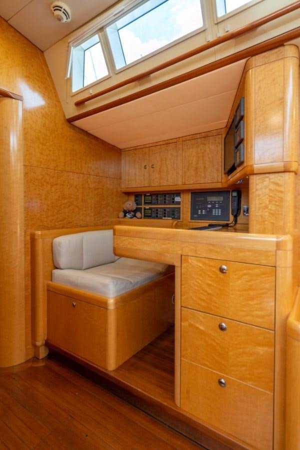 a room with a bed and a desk aboard ECOVER OF SKAGEN Yacht for Sale