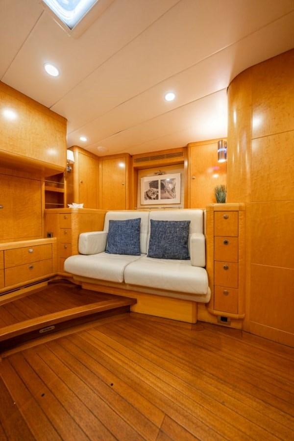 a room with a bed and a wood floor aboard ECOVER OF SKAGEN Yacht for Sale