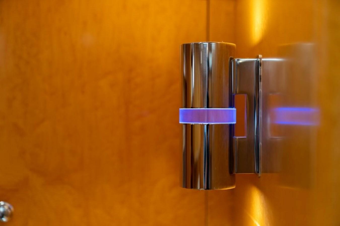 a silver faucet on a brown surface aboard ECOVER OF SKAGEN Yacht for Sale