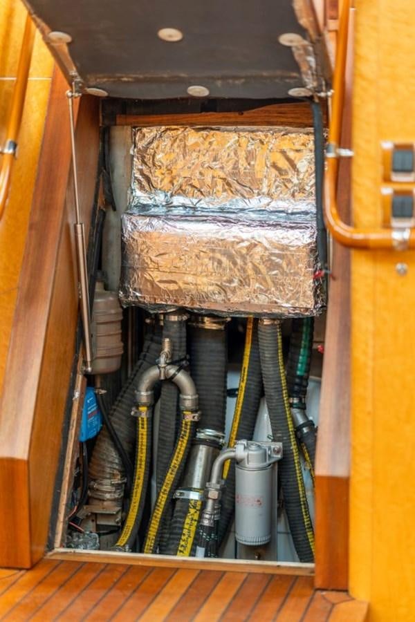 a machine with a large piece of wood in the back aboard ECOVER OF SKAGEN Yacht for Sale