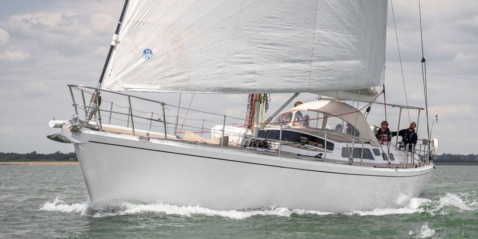 a white boat with people on it aboard ECOVER OF SKAGEN Yacht for Sale