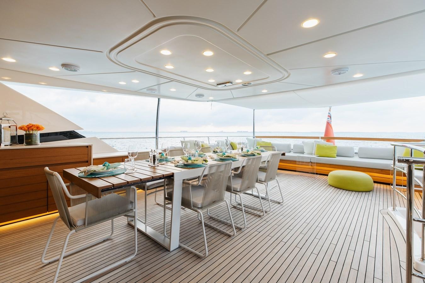 a large room with tables and chairs aboard TAKARA ONE Yacht for Sale