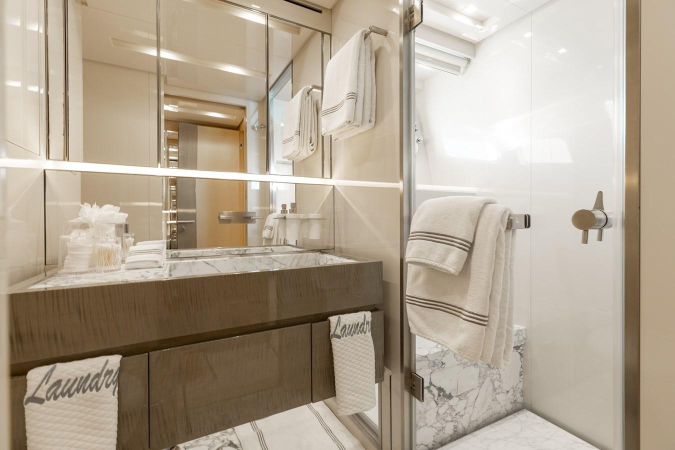a bathroom with a mirror aboard TAKARA ONE Yacht for Sale