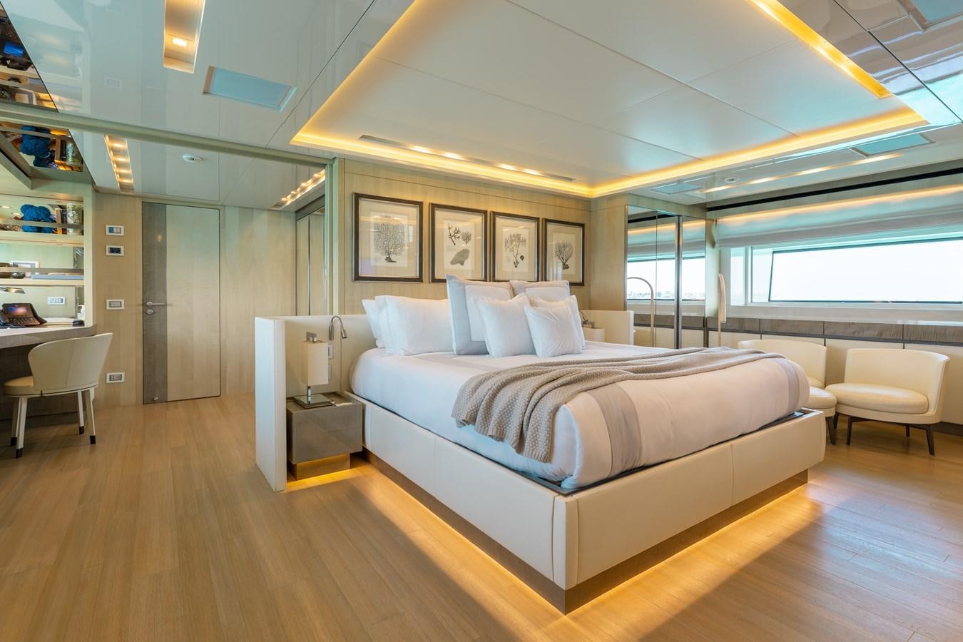 a large bedroom with a large bed aboard TAKARA ONE Yacht for Sale