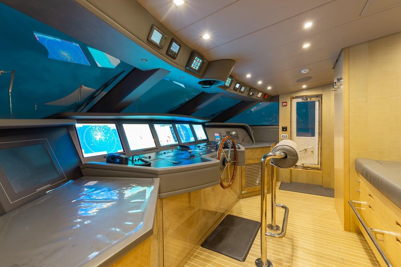 a room with a large window and a large pool table aboard TAKARA ONE Yacht for Sale
