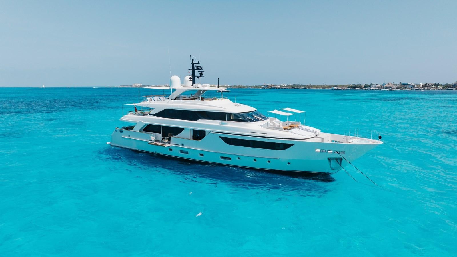 a white boat in the water aboard TAKARA ONE Yacht for Sale
