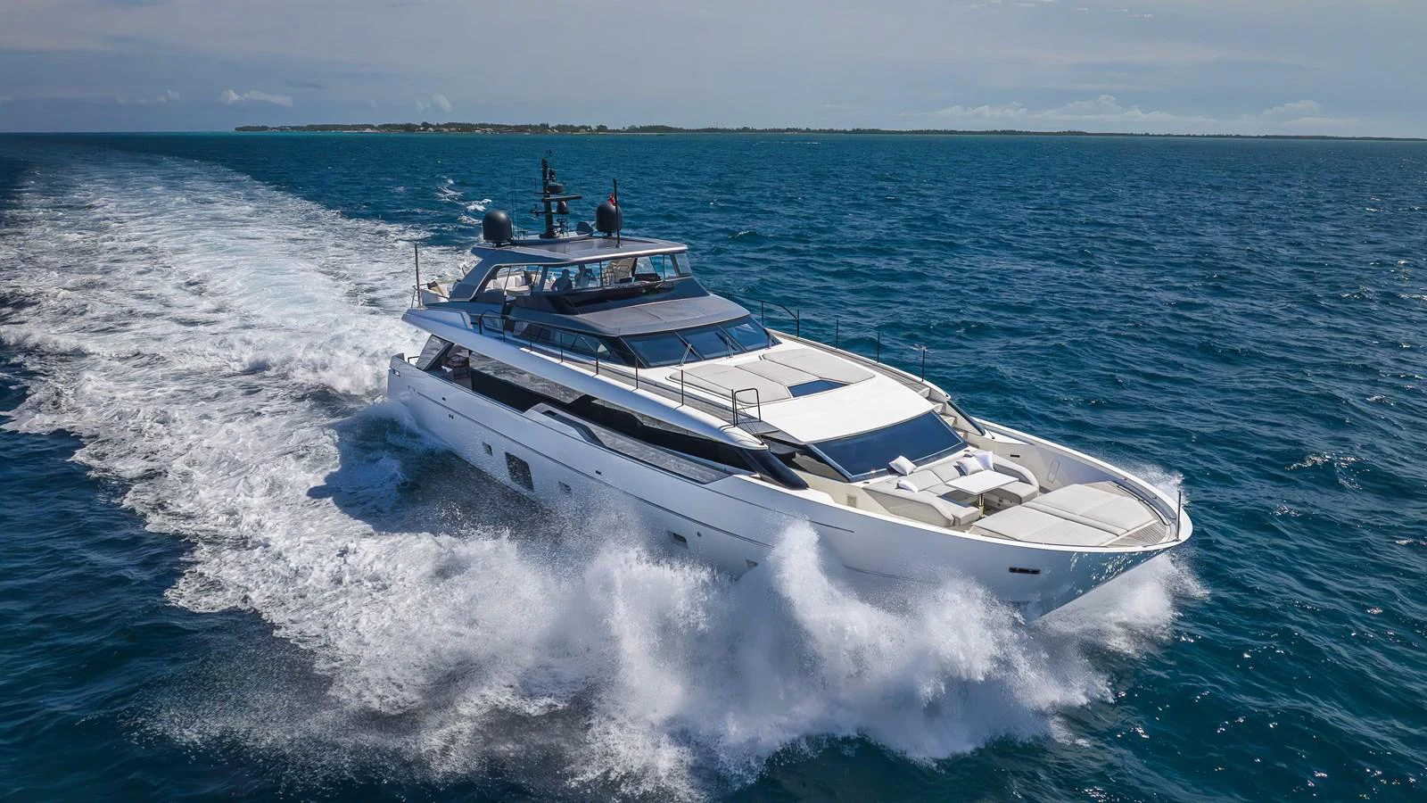 a white boat on the water aboard GATSBY Yacht for Sale