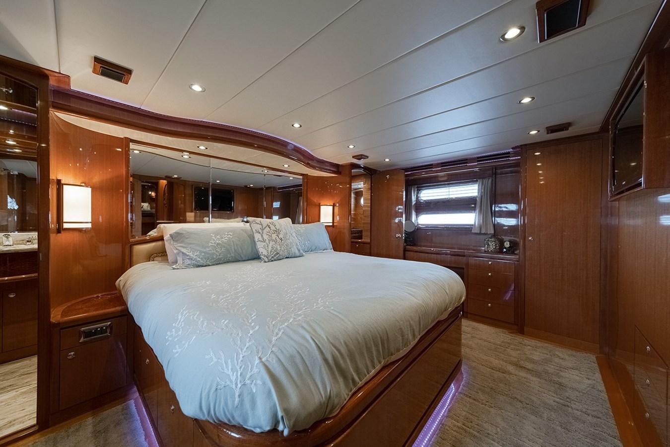 a bed in a cabin aboard ISOBEL III Yacht for Sale