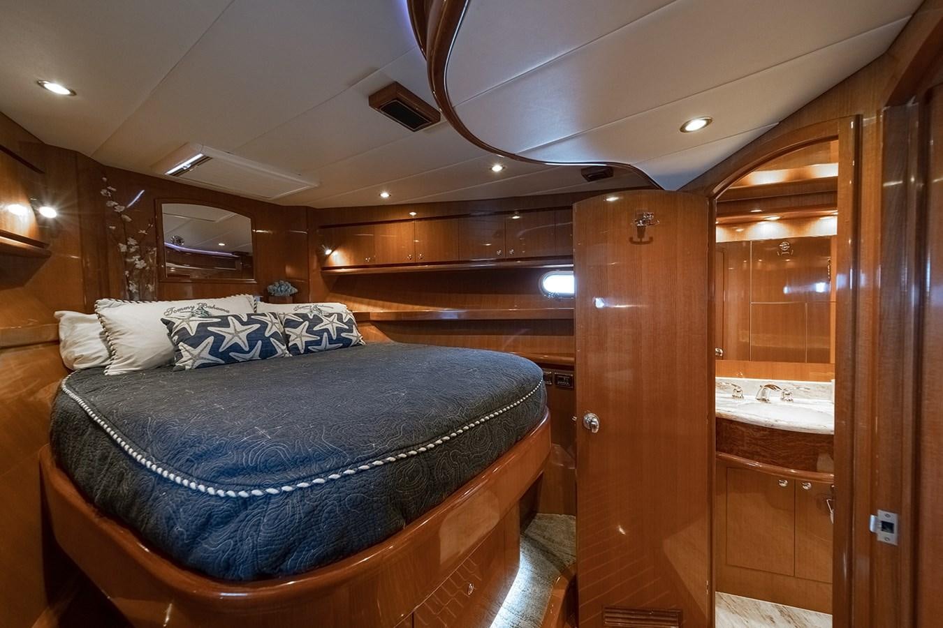 a bed in a cabin aboard ISOBEL III Yacht for Sale