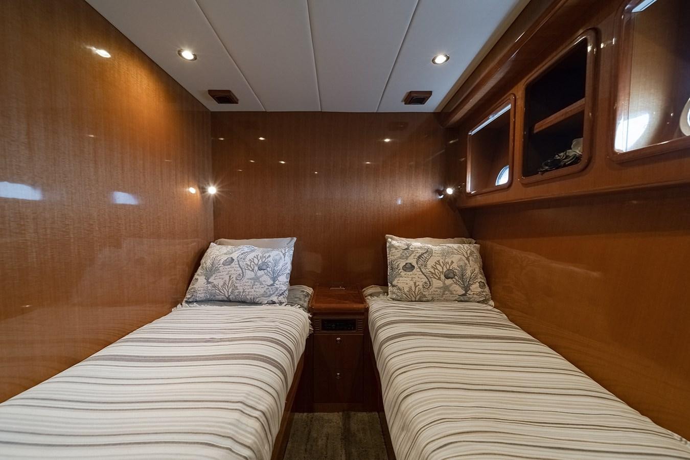 a room with two beds aboard ISOBEL III Yacht for Sale