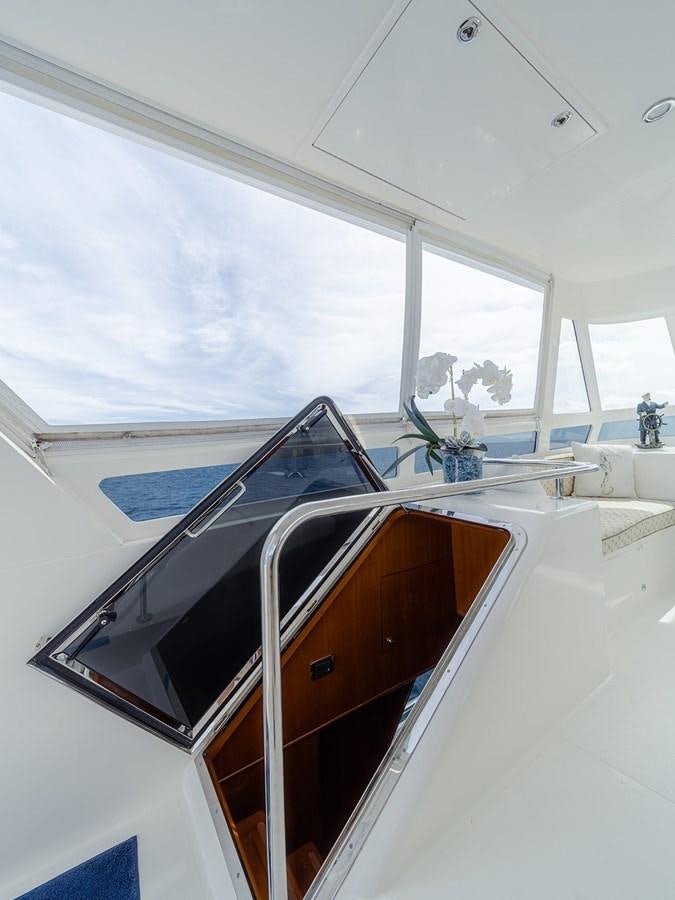 a white car with a large window aboard ISOBEL III Yacht for Sale