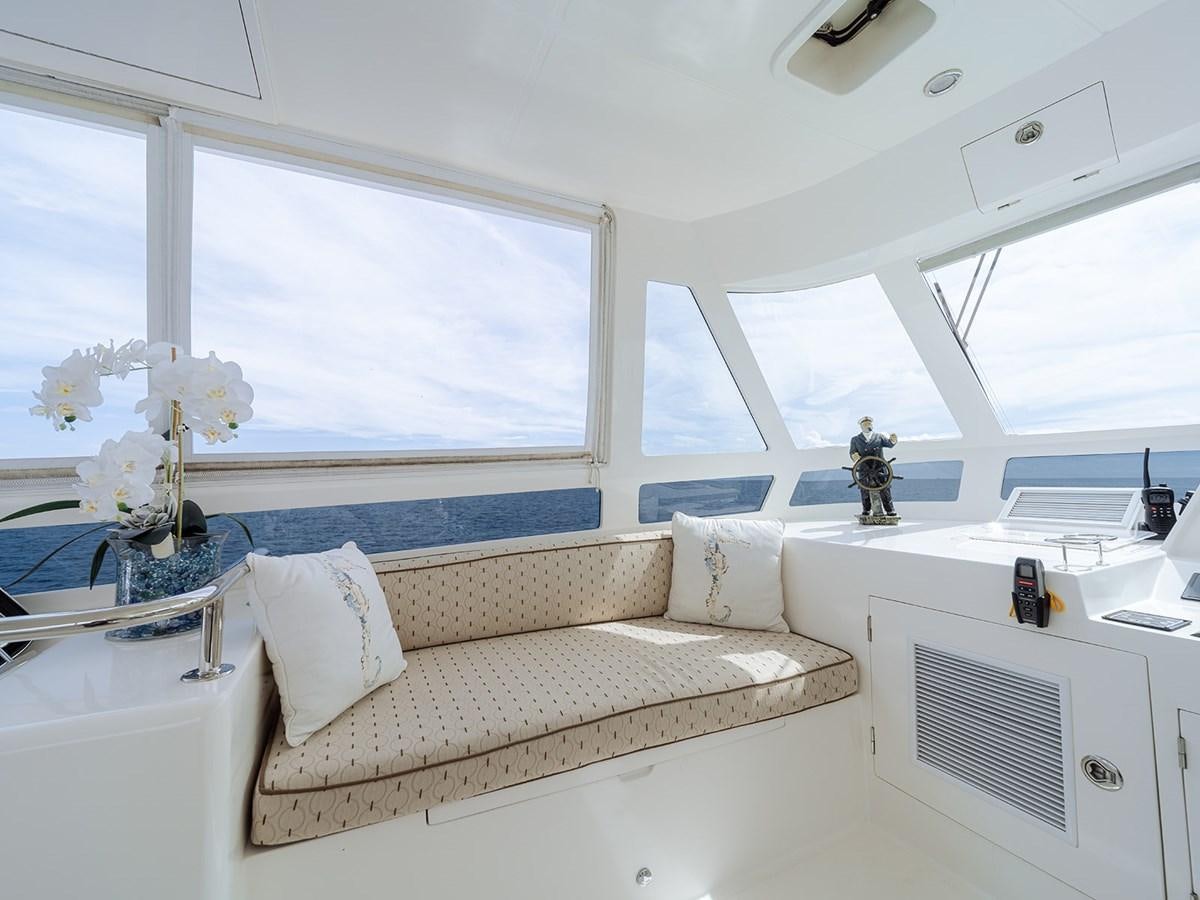 a person standing on a bed aboard ISOBEL III Yacht for Sale