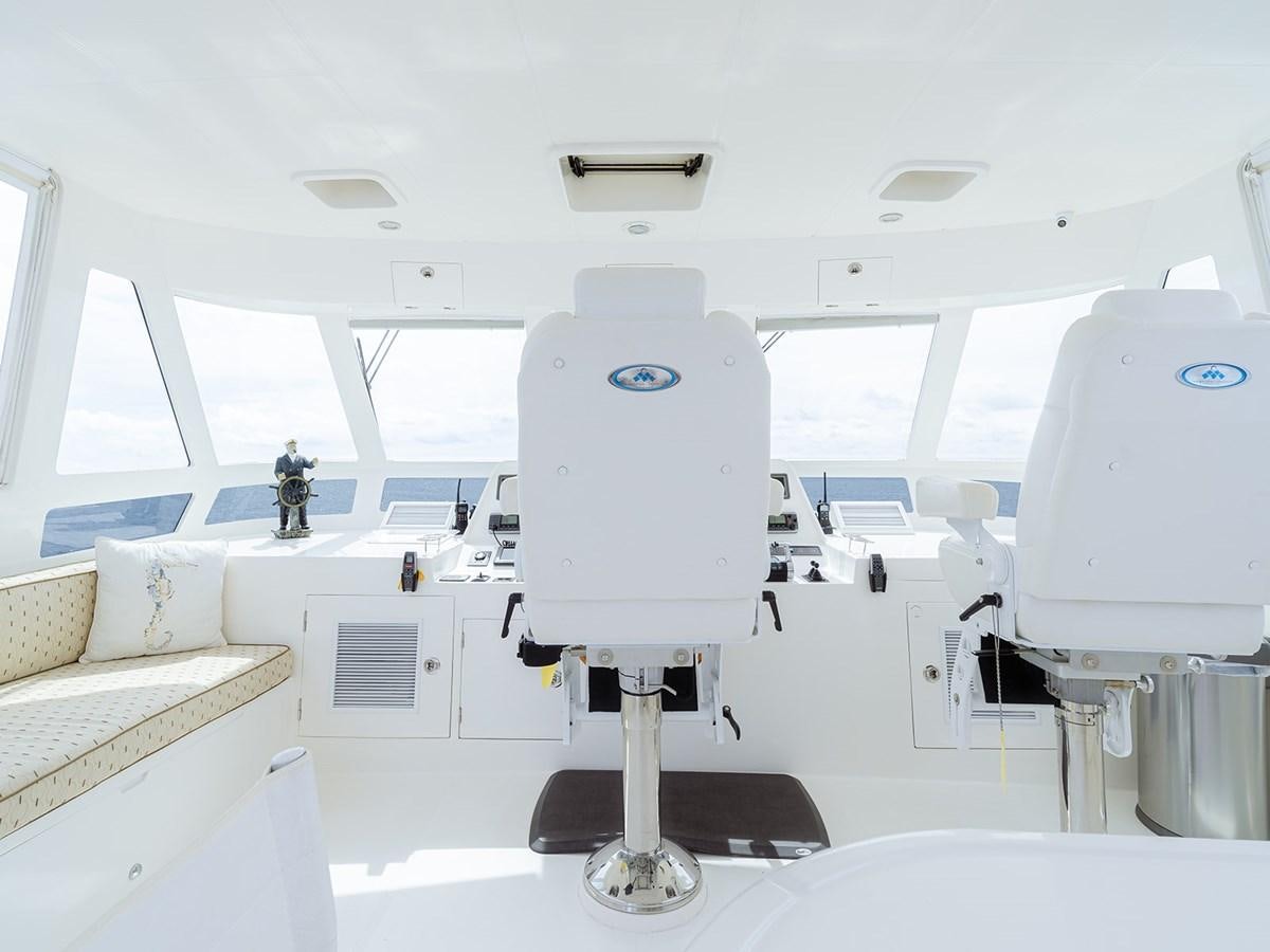 a white machine in a room aboard ISOBEL III Yacht for Sale