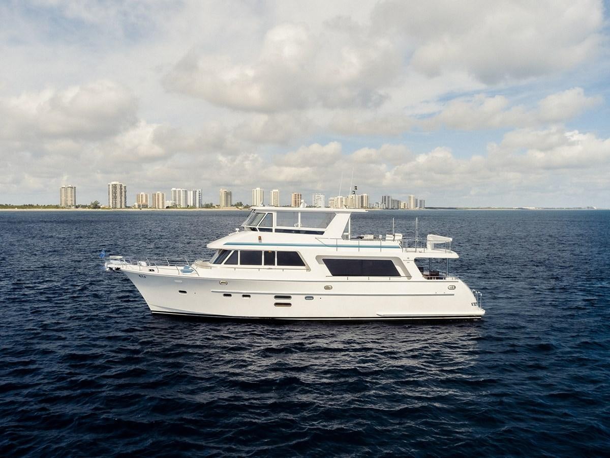 a white yacht in the water aboard ISOBEL III Yacht for Sale