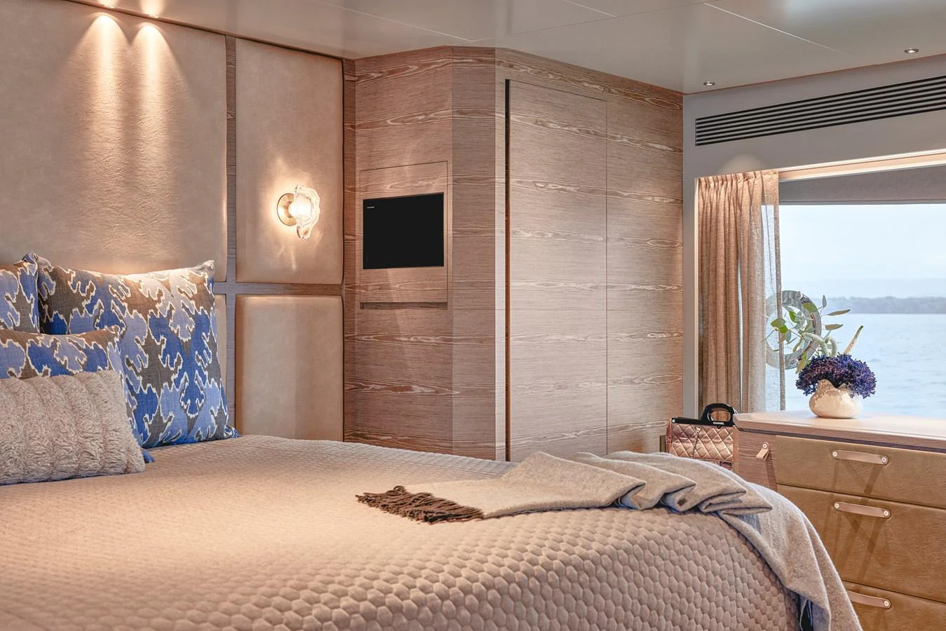 a bed in a room aboard ASKARI Yacht for Sale