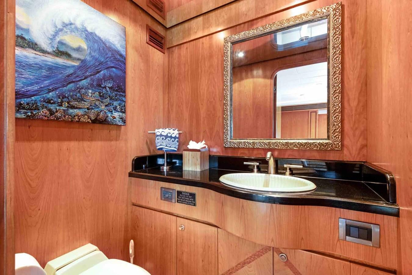 a bathroom with a large mirror aboard B HAPPY Yacht for Sale