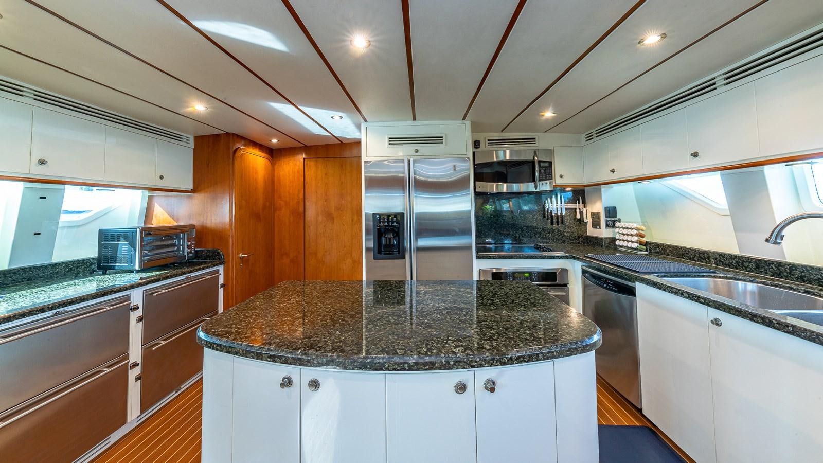 a kitchen with a stainless steel sink aboard B HAPPY Yacht for Sale