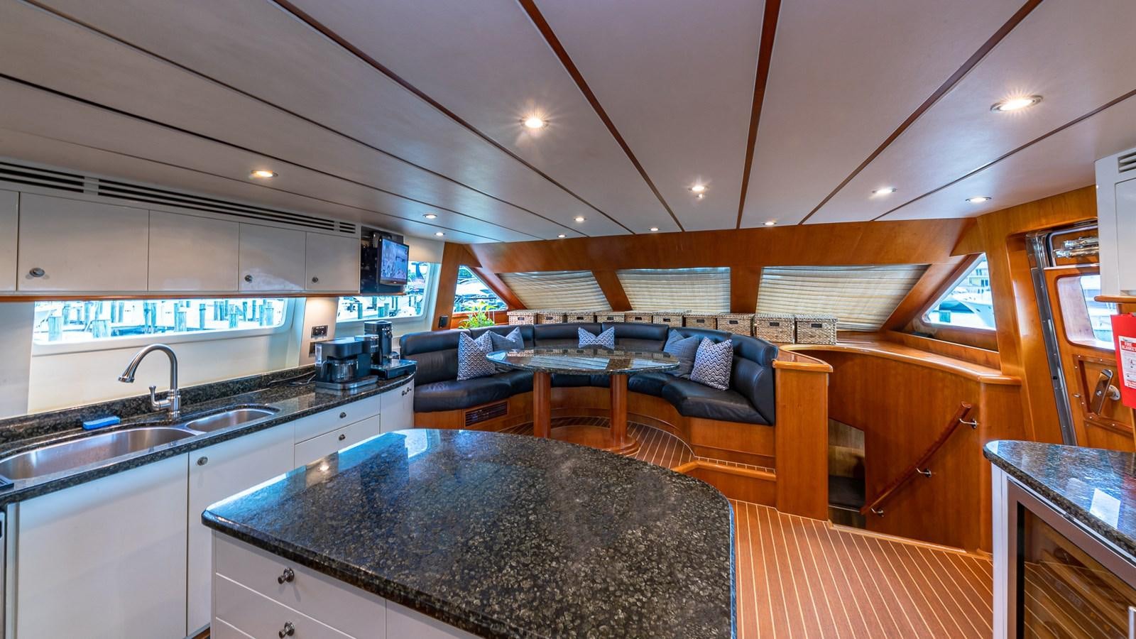 a large kitchen with a large island aboard B HAPPY Yacht for Sale