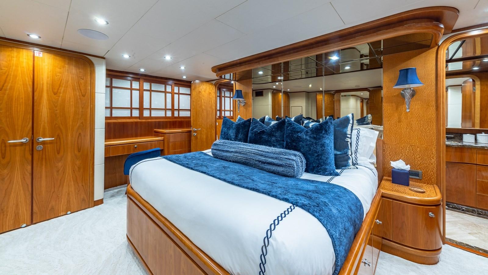 a bed in a room aboard B HAPPY Yacht for Sale