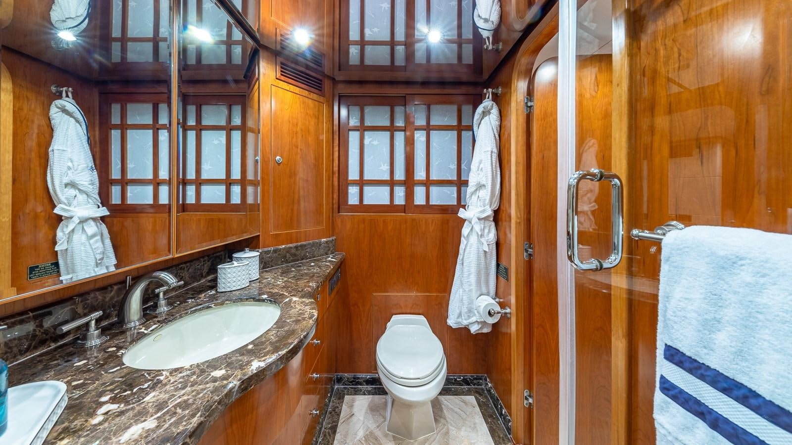 a bathroom with a sink and a toilet aboard B HAPPY Yacht for Sale