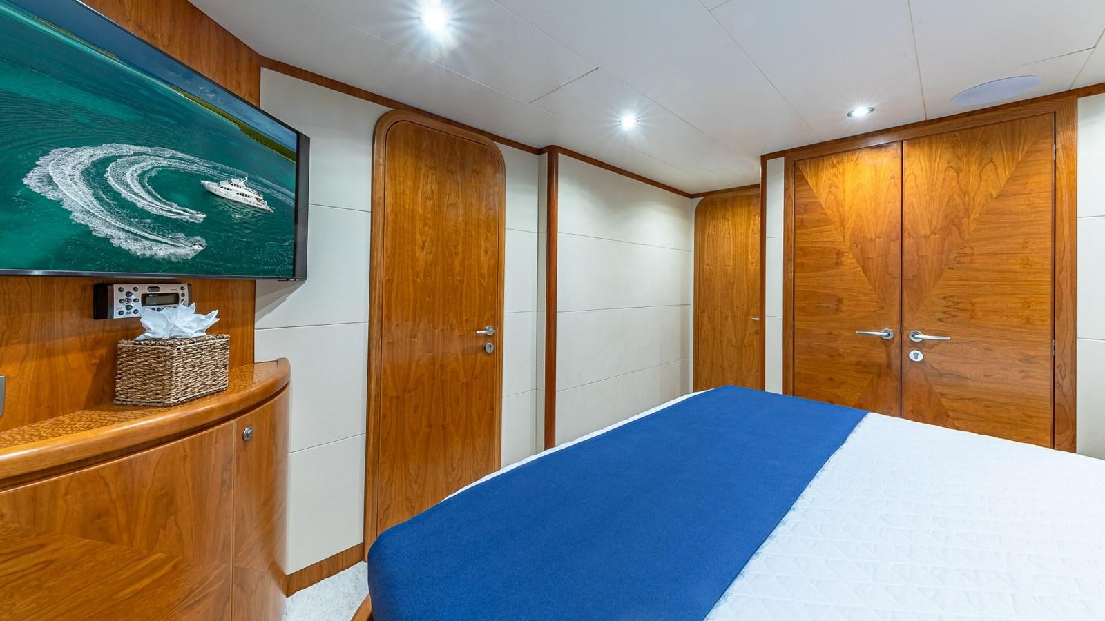 a room with a table and a bed aboard B HAPPY Yacht for Sale