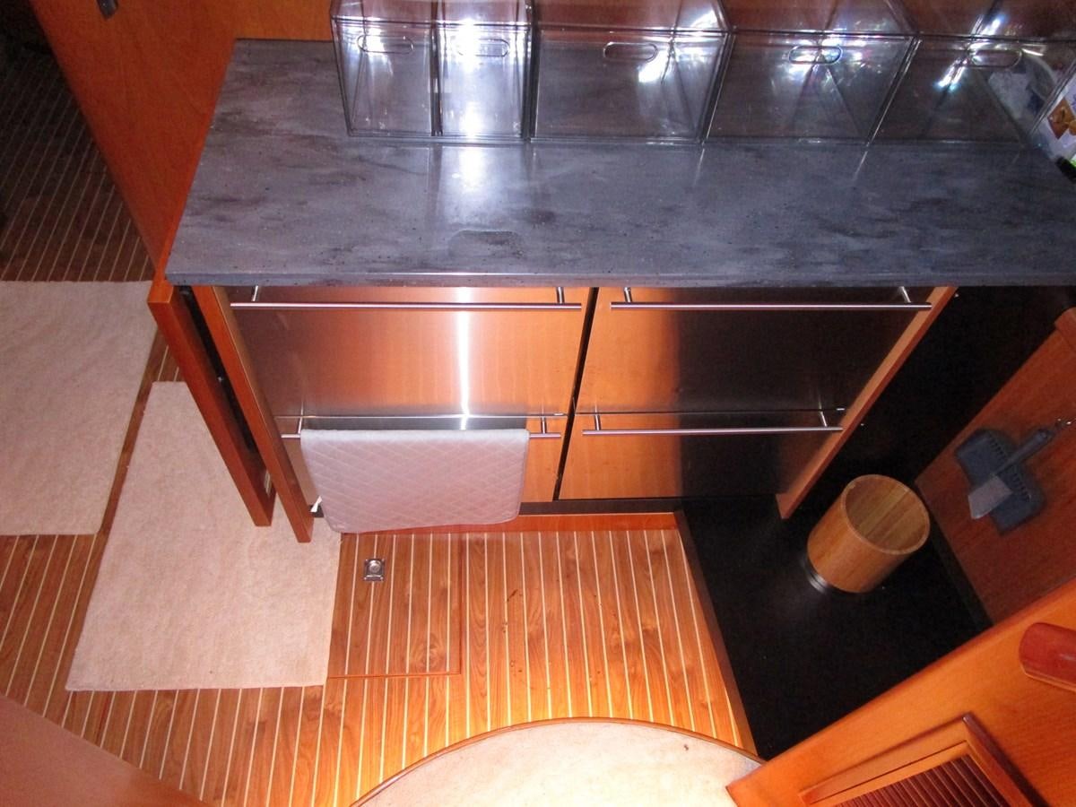 a kitchen with a marble counter top aboard B HAPPY Yacht for Sale