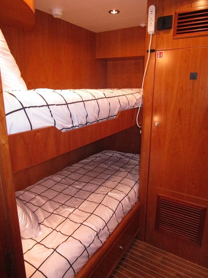a room with two beds aboard B HAPPY Yacht for Sale