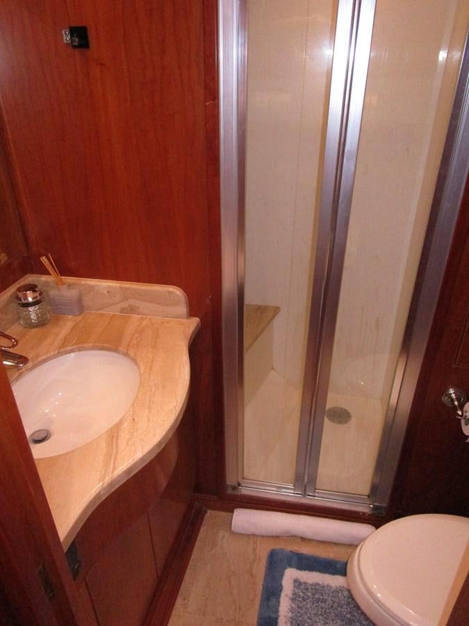 a bathroom with a sink and a toilet aboard B HAPPY Yacht for Sale