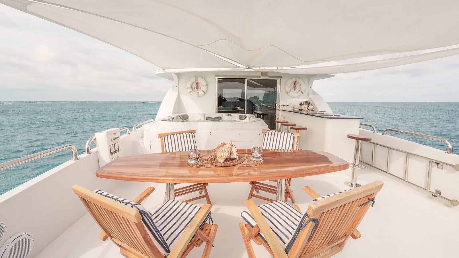 a table on a boat aboard B HAPPY Yacht for Sale