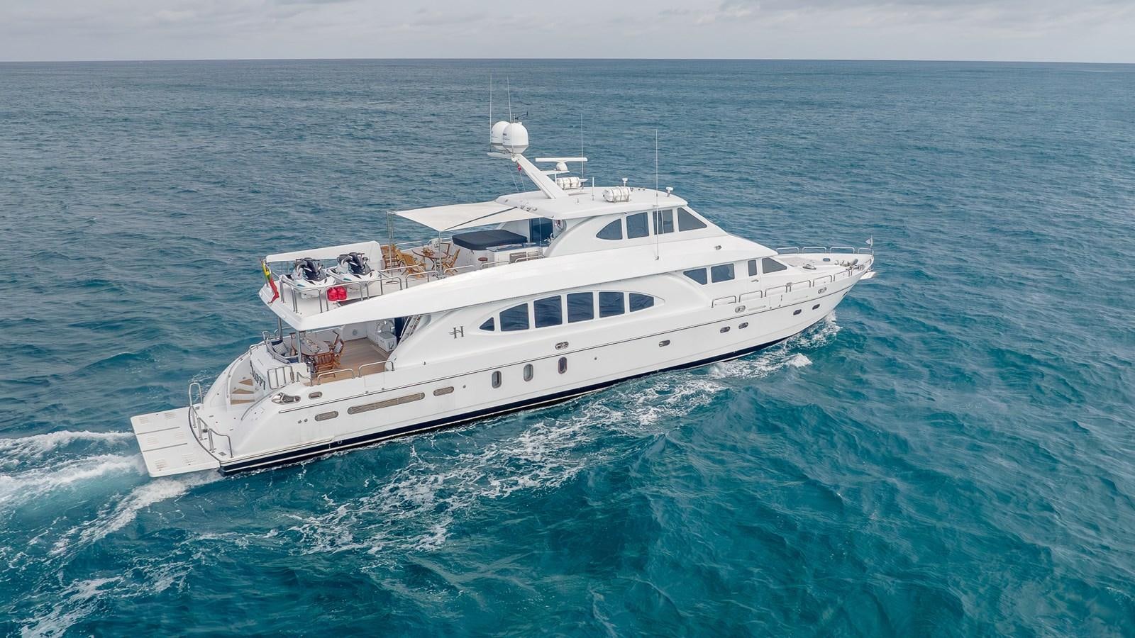 a white boat in the water aboard B HAPPY Yacht for Sale