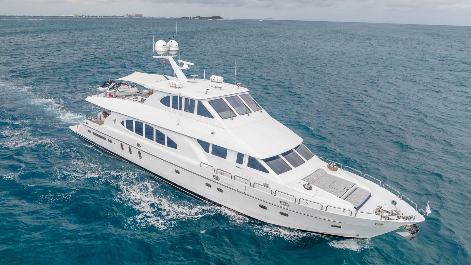 a white yacht in the ocean aboard B HAPPY Yacht for Sale