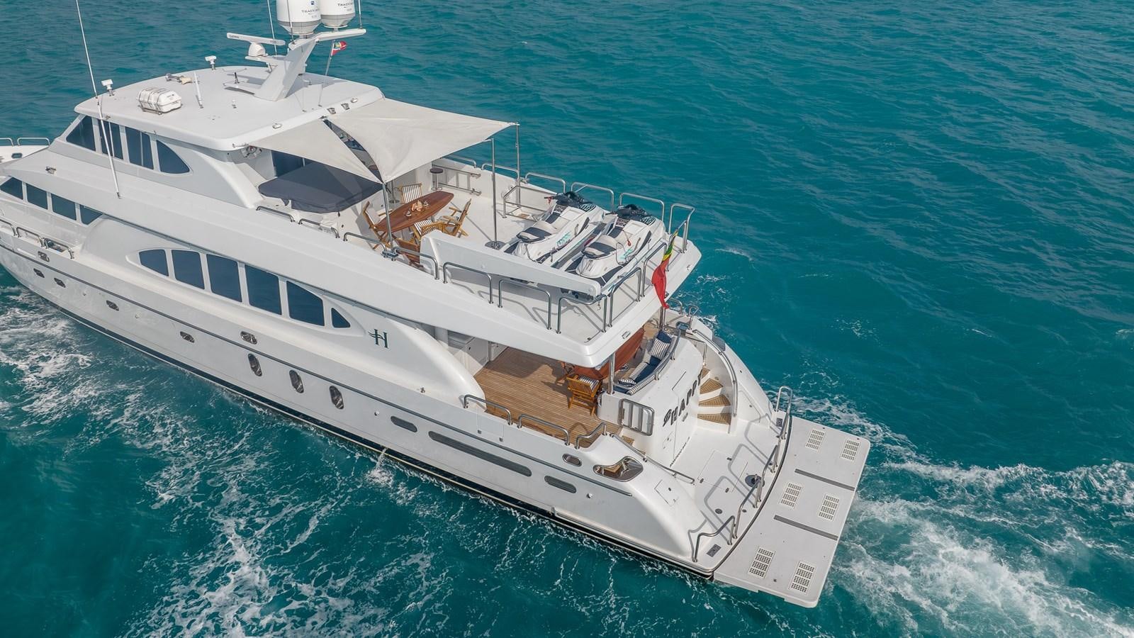 a white boat in the water aboard B HAPPY Yacht for Sale