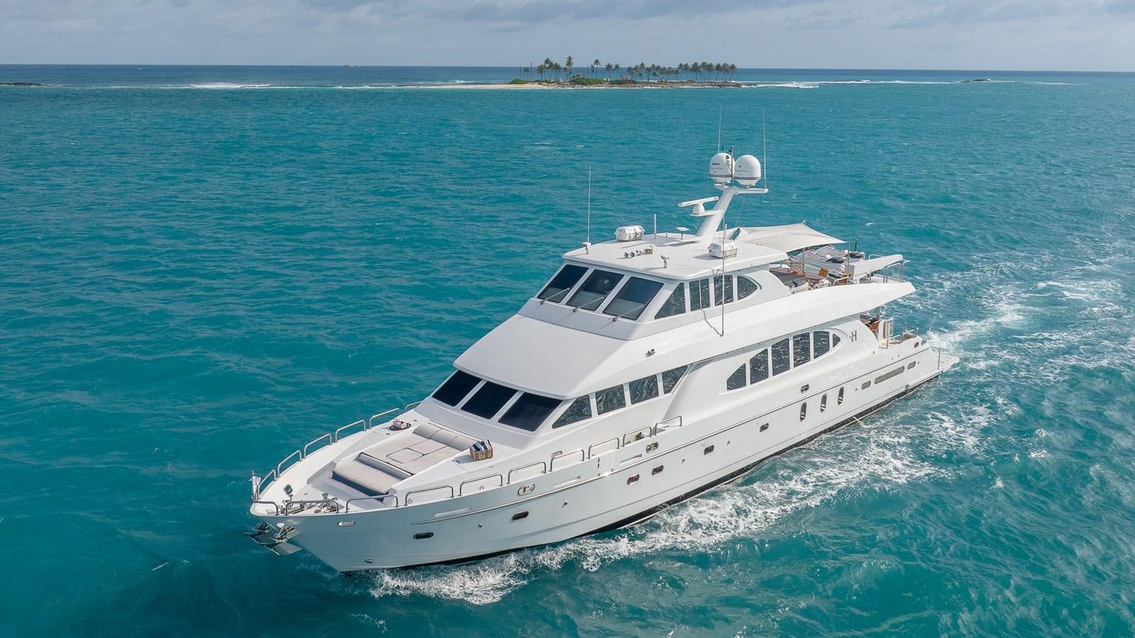 a white yacht in the ocean aboard B HAPPY Yacht for Sale