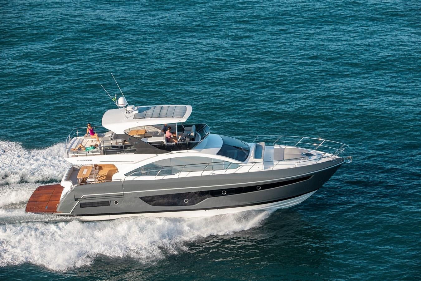 a boat on the water aboard SCHAEFER 660 Yacht for Sale