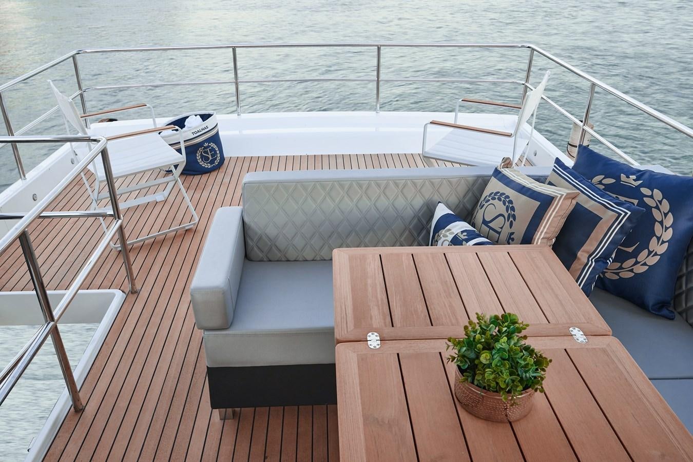a deck with a plant on it aboard SCHAEFER 660 Yacht for Sale