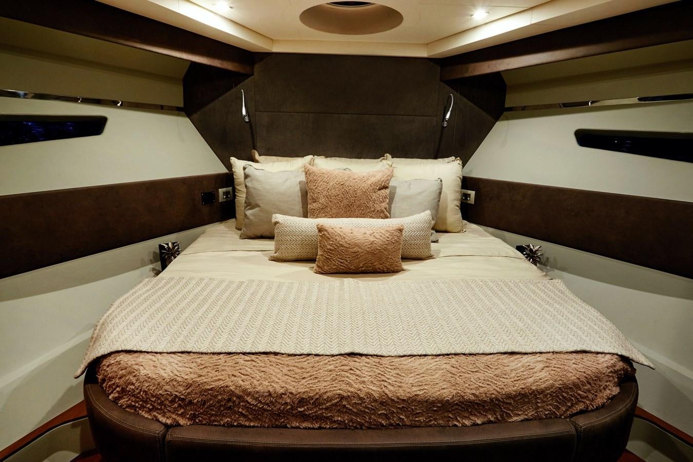 a bed with white sheets aboard SCHAEFER 660 Yacht for Sale