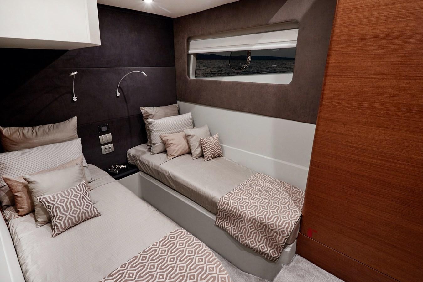 a room with two beds aboard SCHAEFER 660 Yacht for Sale