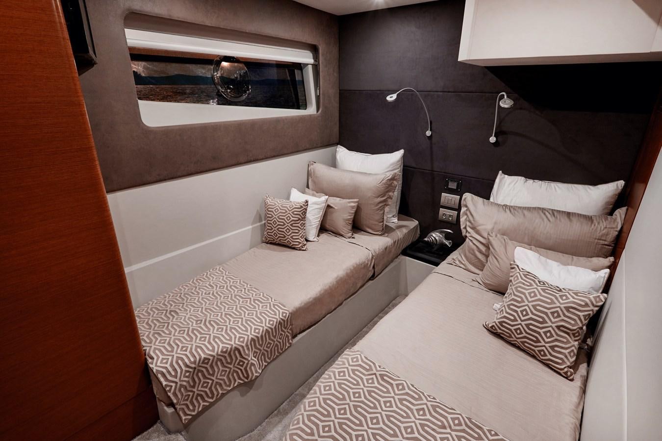a room with two beds aboard SCHAEFER 660 Yacht for Sale